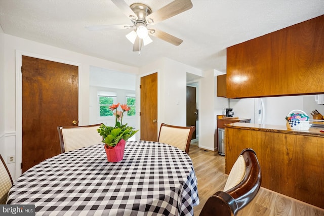 25510 Coltrane Dr, Damascus, MD 20872 - dining space with light wood-type flooring and a ceiling fan