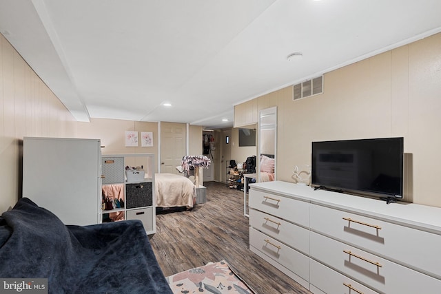 bedroom featuring visible vents, recessed lighting, and dark wood-style flooring