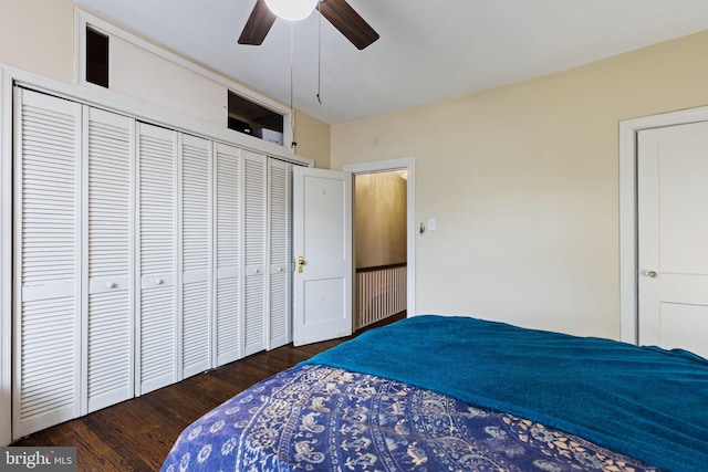 bedroom with wood finished floors, a closet, and ceiling fan