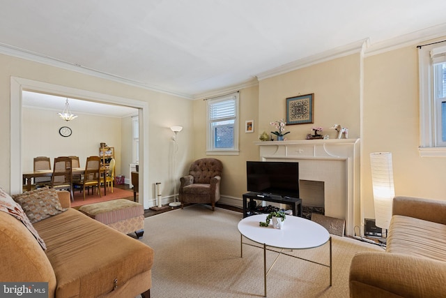 living area featuring a fireplace, plenty of natural light, and ornamental molding