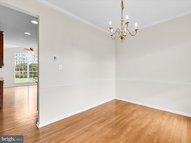 unfurnished room featuring baseboards, ornamental molding, and light wood-style flooring