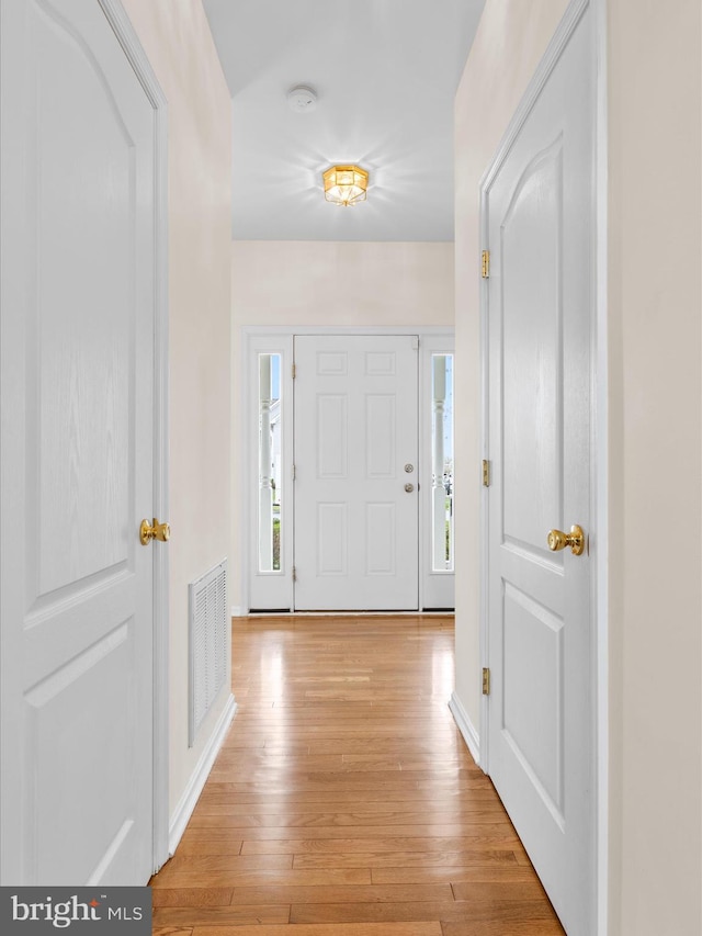 entryway featuring visible vents and light wood-style floors