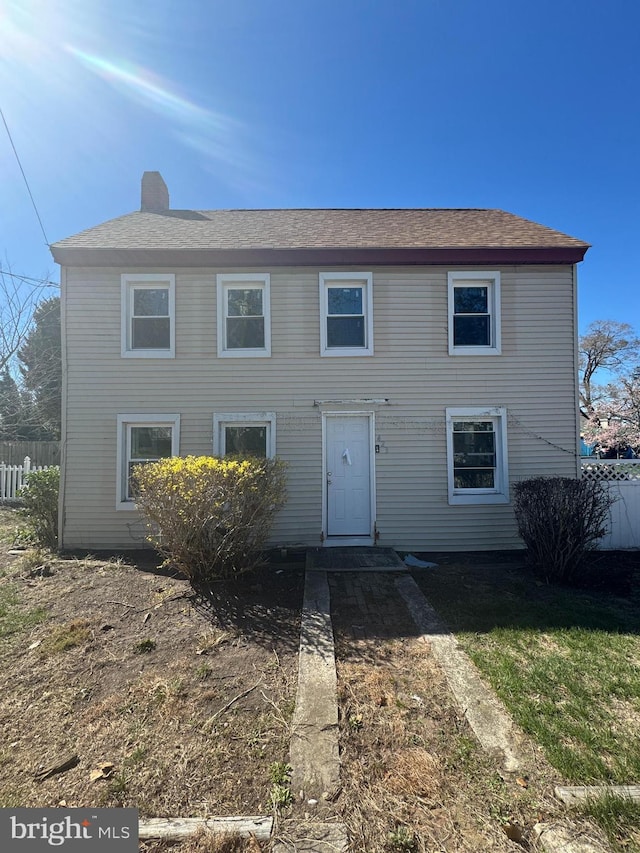 423 Main St, Dorchester, NJ 08316 - colonial-style house featuring fence and a chimney
