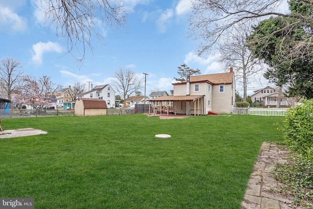 423 Main St, Dorchester, NJ 08316 - view of yard with an outbuilding, a fenced backyard, and a storage shed