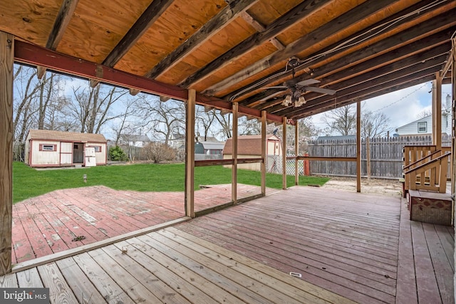 423 Main St, Dorchester, NJ 08316 - deck with an outbuilding, fence, ceiling fan, and a yard