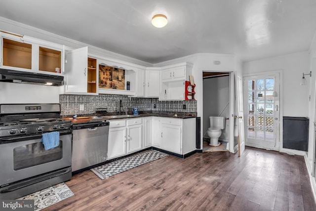 423 Main St, Dorchester, NJ 08316 - kitchen featuring stainless steel appliances, dark countertops, under cabinet range hood, a sink, and open shelves