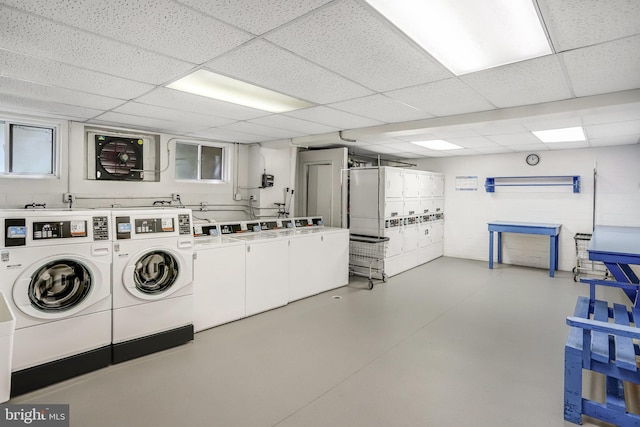 common laundry area with stacked washer and dryer and washing machine and dryer