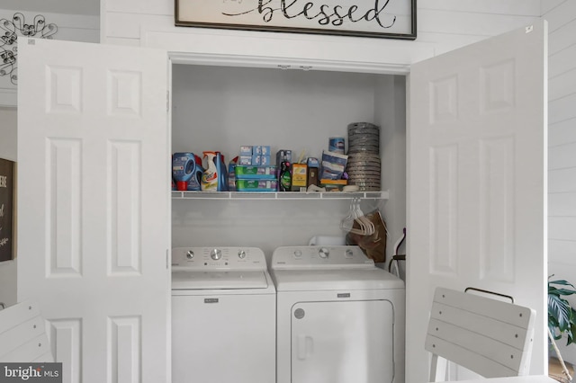 laundry area with independent washer and dryer and laundry area