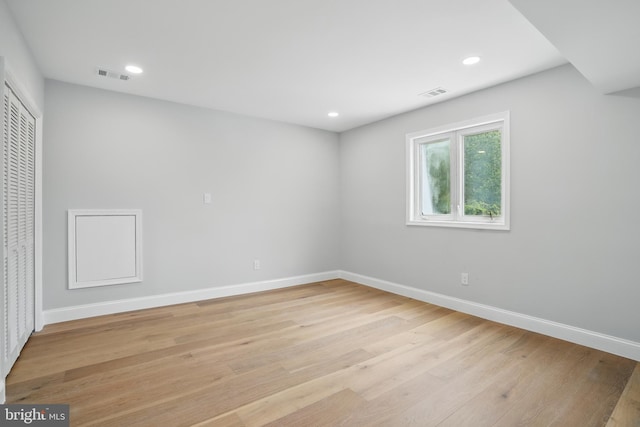 7434 Mason Ln, Falls Church, VA 22042 - unfurnished bedroom featuring baseboards, light wood-type flooring, a closet, and recessed lighting