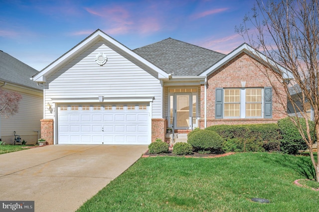 single story home with driveway, brick siding, a front lawn, and roof with shingles