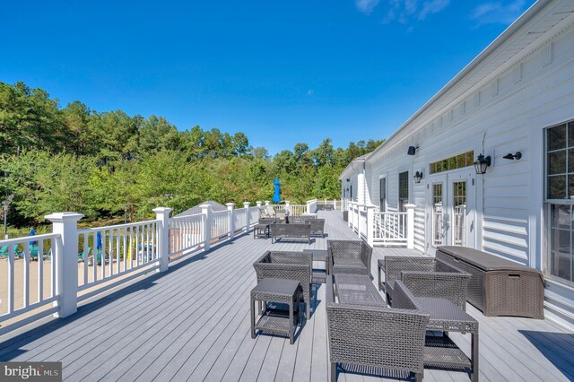 deck featuring outdoor dining area