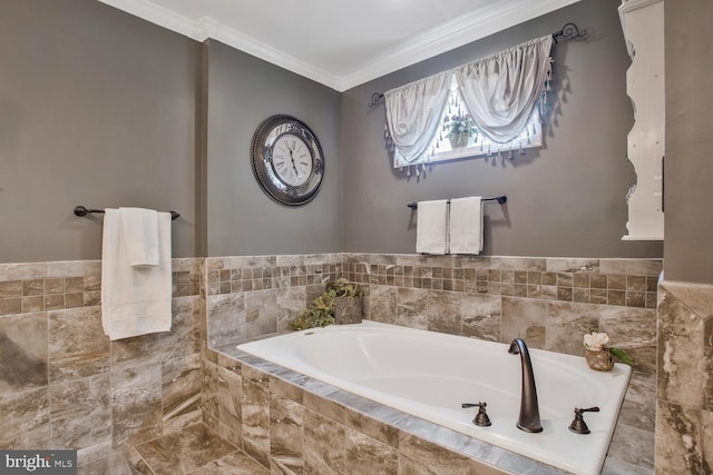 full bath with ornamental molding and a garden tub