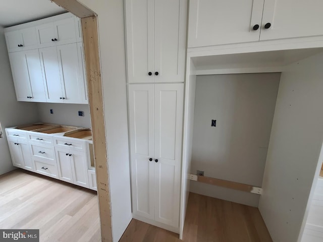 124 Primrose Ct, State College, PA 16801 - interior space featuring light wood-style flooring and white cabinetry