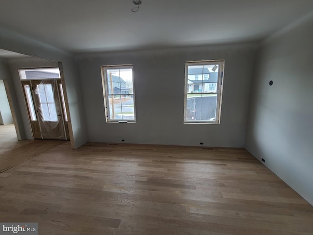 124 Primrose Ct, State College, PA 16801 - spare room featuring wood finished floors and a healthy amount of sunlight