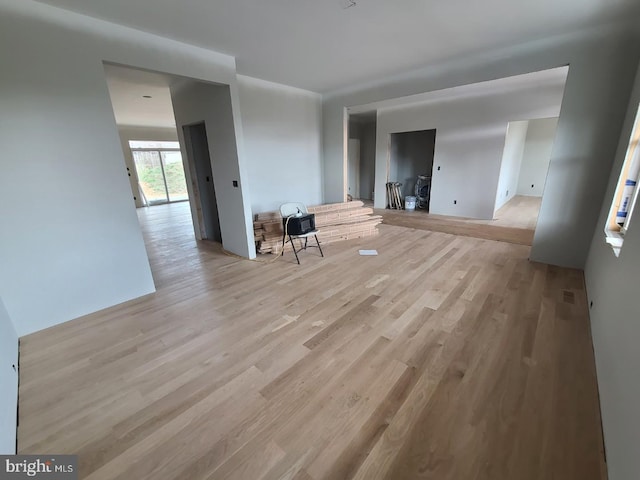 124 Primrose Ct, State College, PA 16801 - unfurnished living room with light wood-style flooring and visible vents