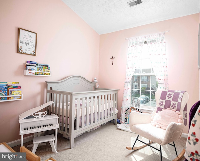 518 Macintosh Cir, Joppa, MD 21085 - carpeted bedroom with visible vents, a nursery area, a textured ceiling, and multiple windows