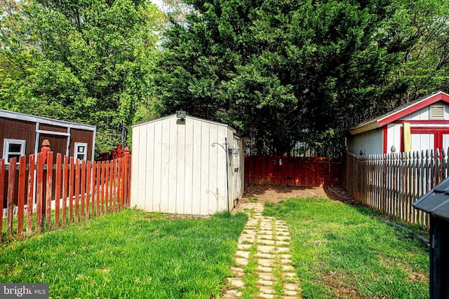 518 Macintosh Cir, Joppa, MD 21085 - view of yard with an outdoor structure, a shed, and a fenced backyard