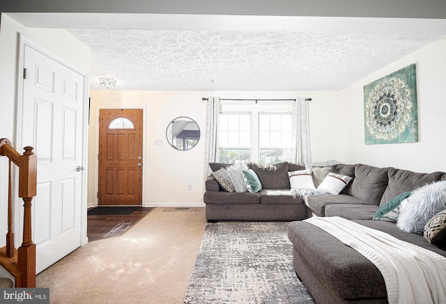518 Macintosh Cir, Joppa, MD 21085 - carpeted living area with baseboards and a textured ceiling