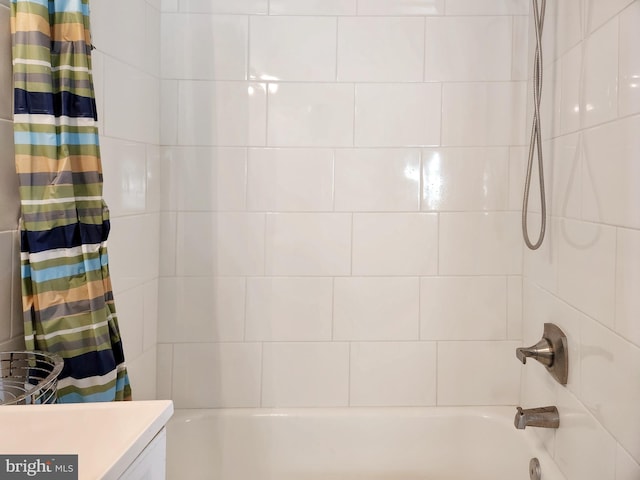 5900 Queenston St Unit 498, Springfield, VA 22152 - bathroom featuring vanity and shower / tub combo with curtain