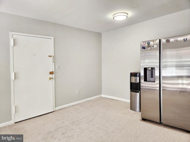 5900 Queenston St Unit 498, Springfield, VA 22152 - kitchen featuring stainless steel fridge with ice dispenser, baseboards, and carpet