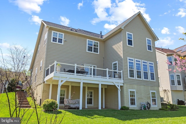 2710 Beech Orchard Ln, Upper Marlboro, MD 20774 - back of property featuring a lawn, stairway, and a deck