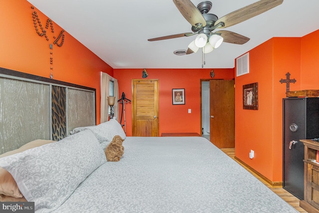 2220 Timothy Dr, Westminster, MD 21157 - bedroom with baseboards, visible vents, light wood-style flooring, and a ceiling fan
