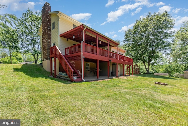 2220 Timothy Dr, Westminster, MD 21157 - rear view of property featuring stairs, a chimney, a wooden deck, and a yard