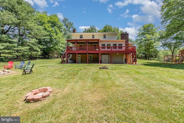 2220 Timothy Dr, Westminster, MD 21157 - rear view of property featuring a wooden deck, a chimney, stairway, a fire pit, and a yard
