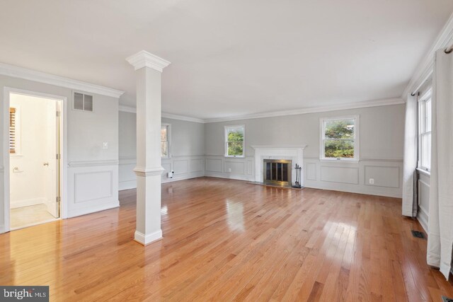 2220 Timothy Dr, Westminster, MD 21157 - unfurnished living room with ornate columns, a wealth of natural light, and visible vents