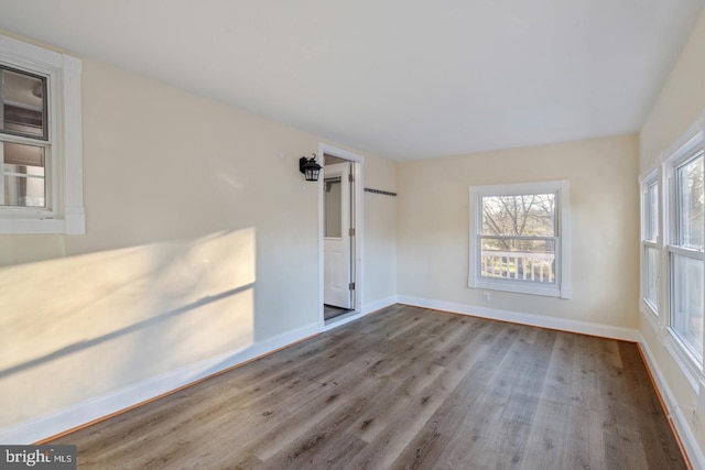 2220 Timothy Dr, Westminster, MD 21157 - empty room with baseboards and wood finished floors