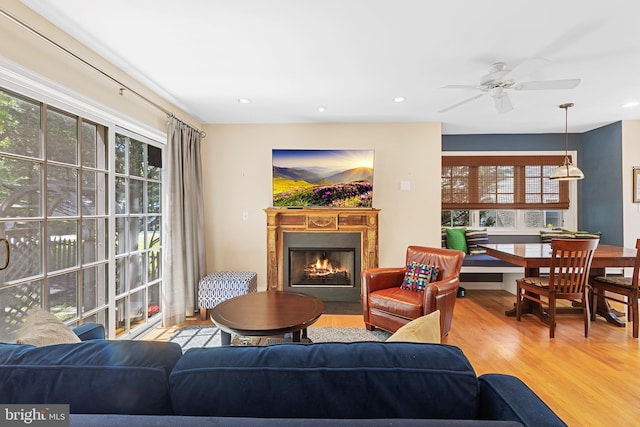 76 Deepdale Rd, Wayne, PA 19087 - living room featuring wood finished floors, a lit fireplace, a ceiling fan, and recessed lighting