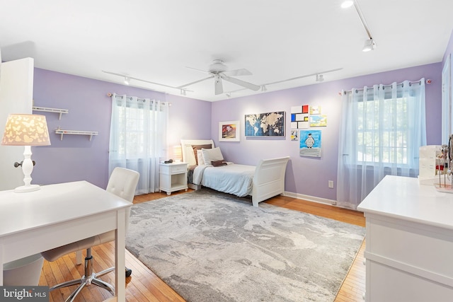 76 Deepdale Rd, Wayne, PA 19087 - bedroom featuring rail lighting, light wood-style flooring, and a desk