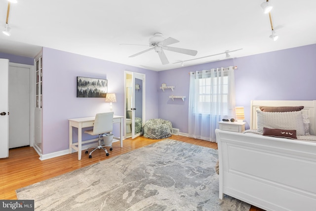 76 Deepdale Rd, Wayne, PA 19087 - bedroom featuring rail lighting, wood finished floors, an office area, and ceiling fan