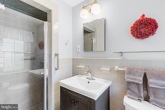 76 Deepdale Rd, Wayne, PA 19087 - full bathroom featuring a shower stall, vanity, tile walls, and a wainscoted wall