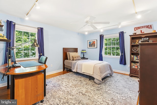 76 Deepdale Rd, Wayne, PA 19087 - bedroom with rail lighting and wood finished floors