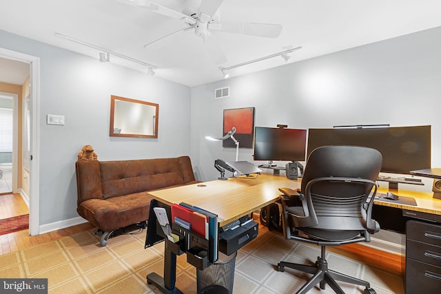 76 Deepdale Rd, Wayne, PA 19087 - home office with track lighting, ceiling fan, and light wood-style flooring