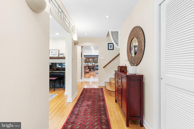 76 Deepdale Rd, Wayne, PA 19087 - corridor featuring light wood finished floors, stairs, and recessed lighting