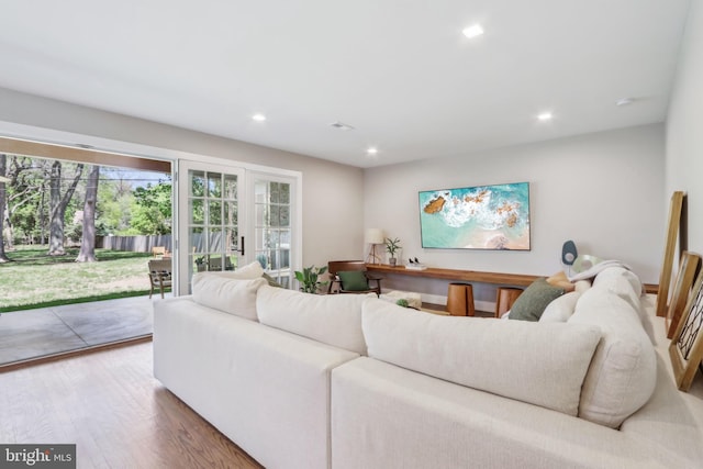 living area featuring recessed lighting and wood finished floors