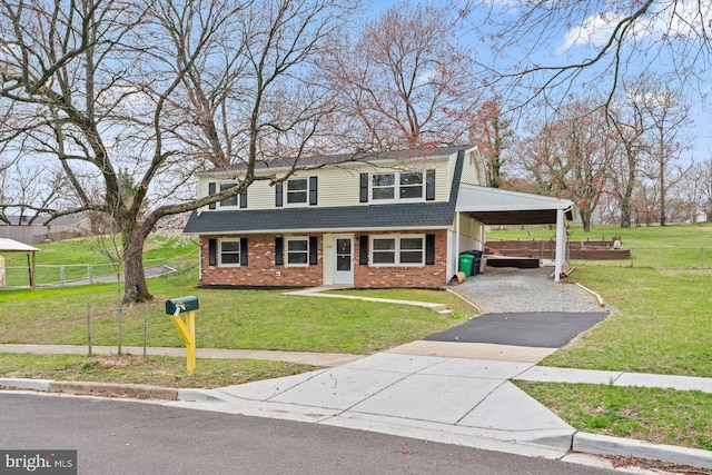 3605 Eyre Dr S, Upper Marlboro, MD 20772 - view of front facade featuring roof with shingles, aphalt driveway, a front lawn, brick siding, and an attached carport