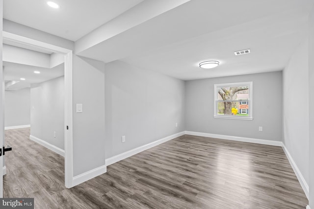 3605 Eyre Dr S, Upper Marlboro, MD 20772 - basement featuring baseboards, visible vents, and wood finished floors