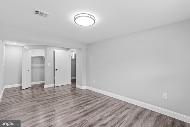 3605 Eyre Dr S, Upper Marlboro, MD 20772 - unfurnished bedroom featuring baseboards, visible vents, a closet, and wood finished floors