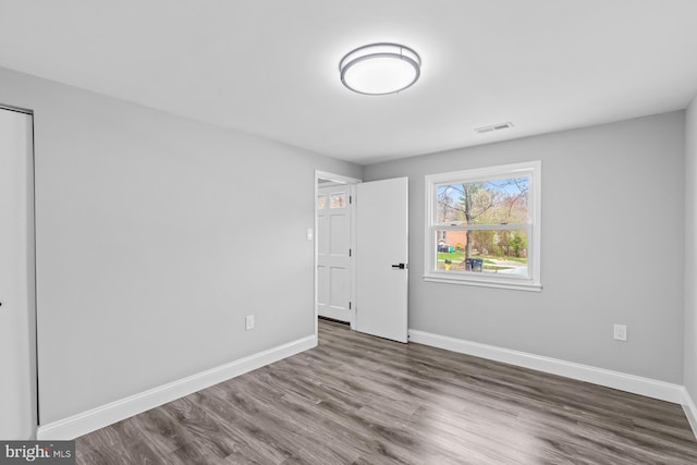 3605 Eyre Dr S, Upper Marlboro, MD 20772 - unfurnished bedroom featuring wood finished floors, baseboards, and visible vents