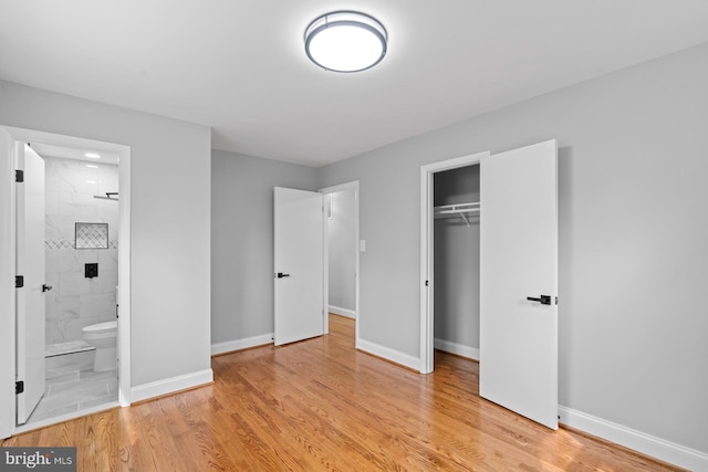 3605 Eyre Dr S, Upper Marlboro, MD 20772 - unfurnished bedroom with baseboards, connected bathroom, a closet, and light wood finished floors