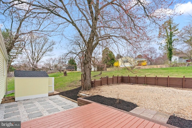3605 Eyre Dr S, Upper Marlboro, MD 20772 - deck with fence, an outdoor structure, a yard, and a shed