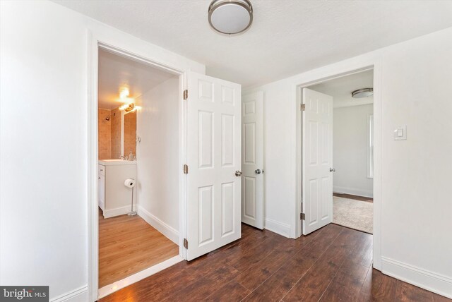 5431 Hines Rd, Frederick, MD 21704 - unfurnished bedroom featuring baseboards and dark wood finished floors