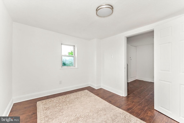 5431 Hines Rd, Frederick, MD 21704 - unfurnished bedroom with dark wood-style flooring and baseboards
