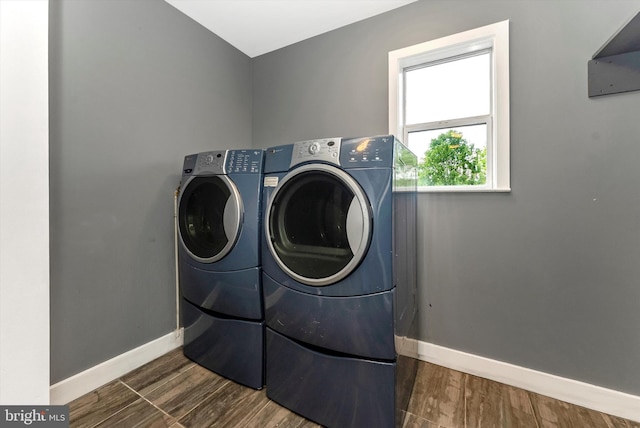 5431 Hines Rd, Frederick, MD 21704 - laundry room with laundry area, baseboards, wood finished floors, and washer and dryer