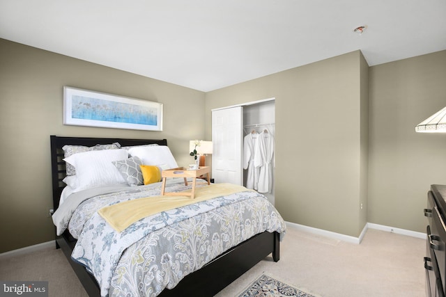 13824 Custis Sq, Woodbridge, VA 22191 - bedroom with baseboards, a closet, and light colored carpet