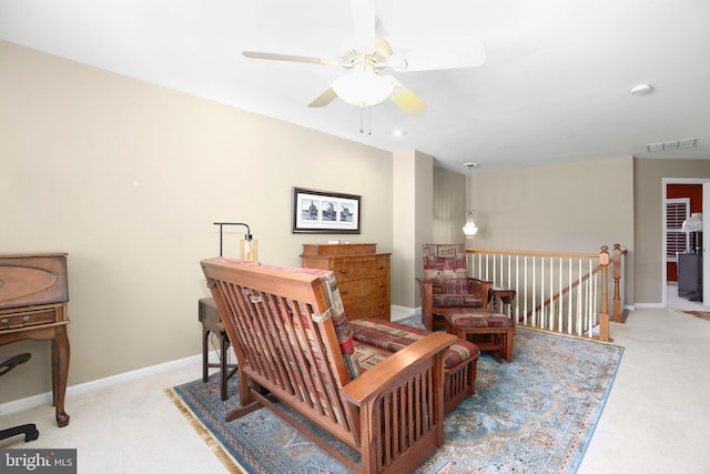 13824 Custis Sq, Woodbridge, VA 22191 - living area with ceiling fan, an upstairs landing, light colored carpet, and visible vents