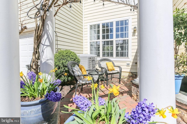 13824 Custis Sq, Woodbridge, VA 22191 - view of patio / terrace featuring central AC